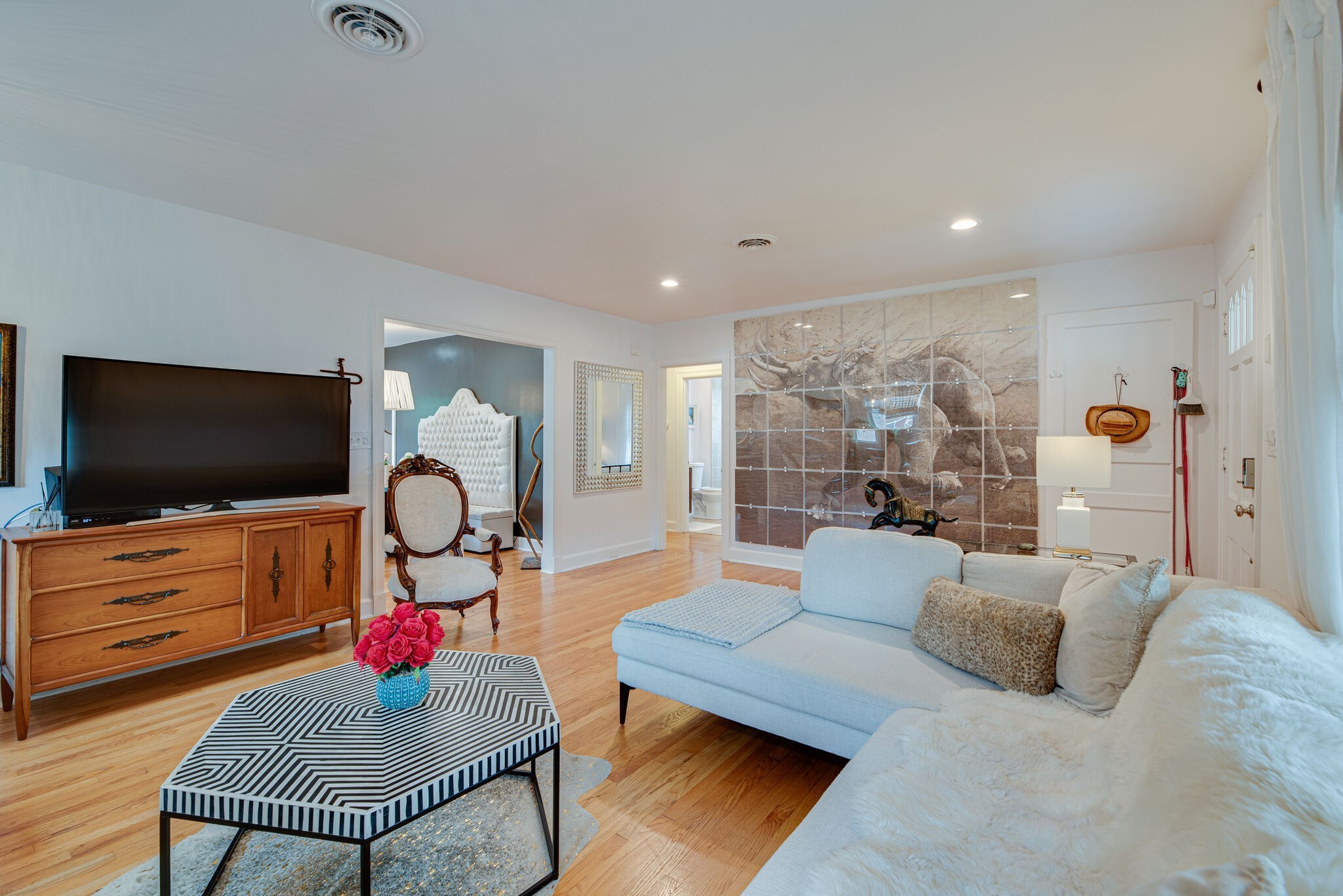 1715 Holly Street Nashville, TN 37206 - Photo 10 of 54 a living room with furniture kitchen view and a flat screen tv