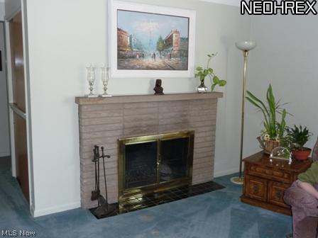 35105 Martin Road Willoughby, OH 44094 - Photo 4 of 18 stone fireplace accents the spacious living room.