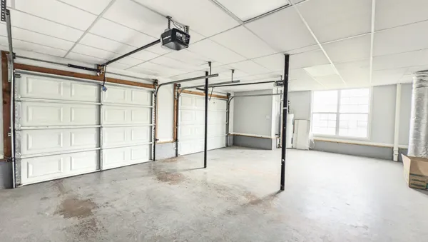 a view of balcony with wooden floor