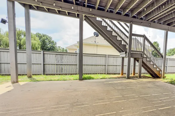 a view of a garden with an outdoor space