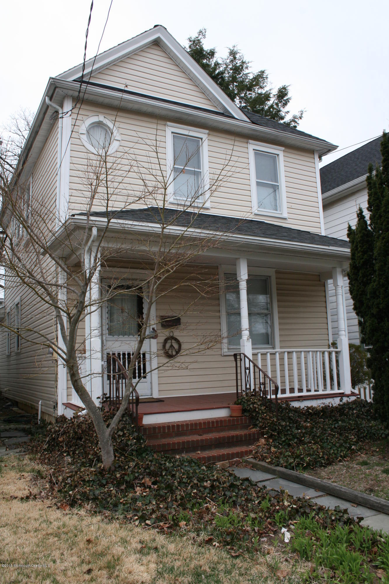 42 Spring Street Red Bank, NJ 07701 - Photo 1 of 24 a front view of a house
