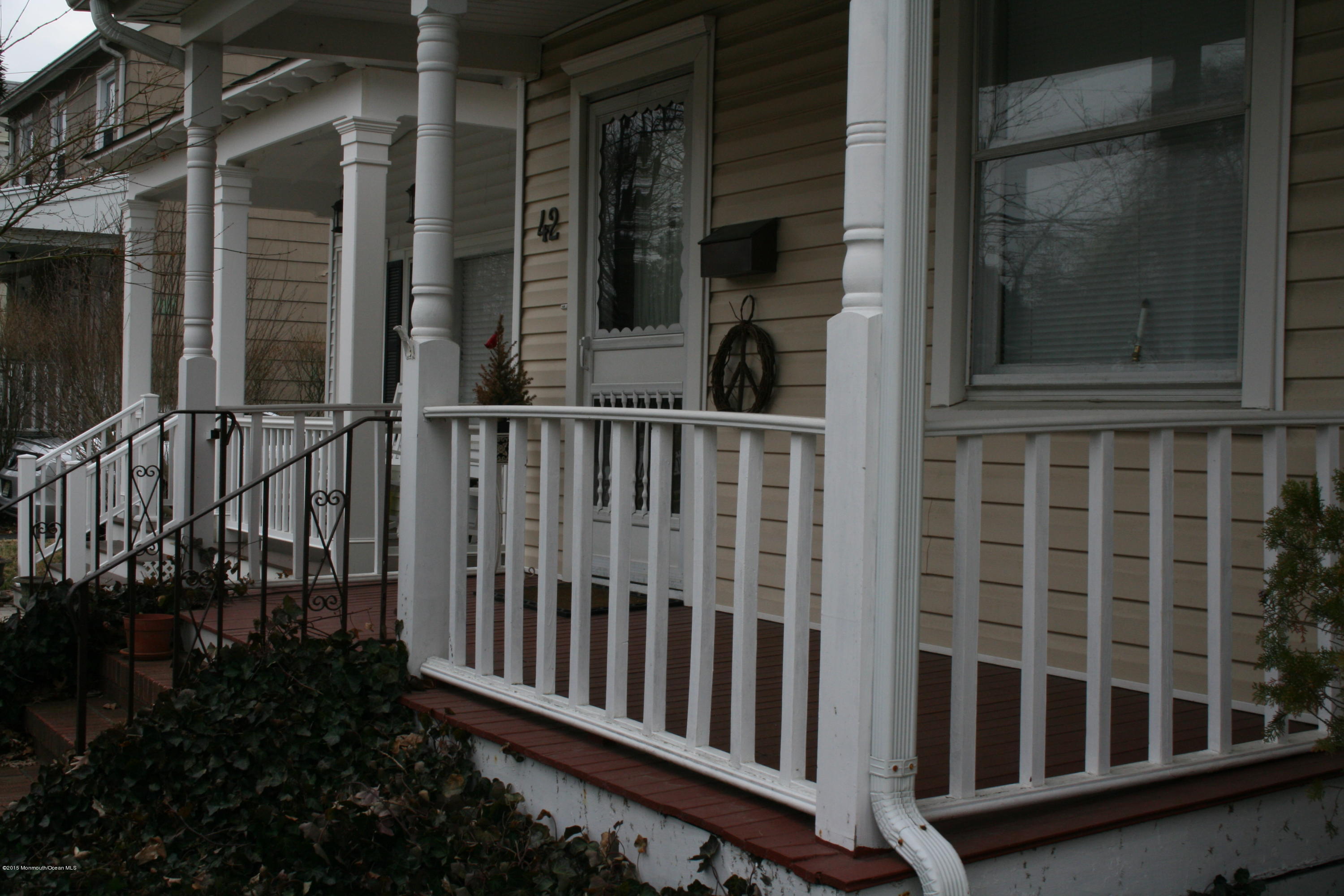 42 Spring Street Red Bank, NJ 07701 - Photo 3 of 24 a view of a house with a small yard