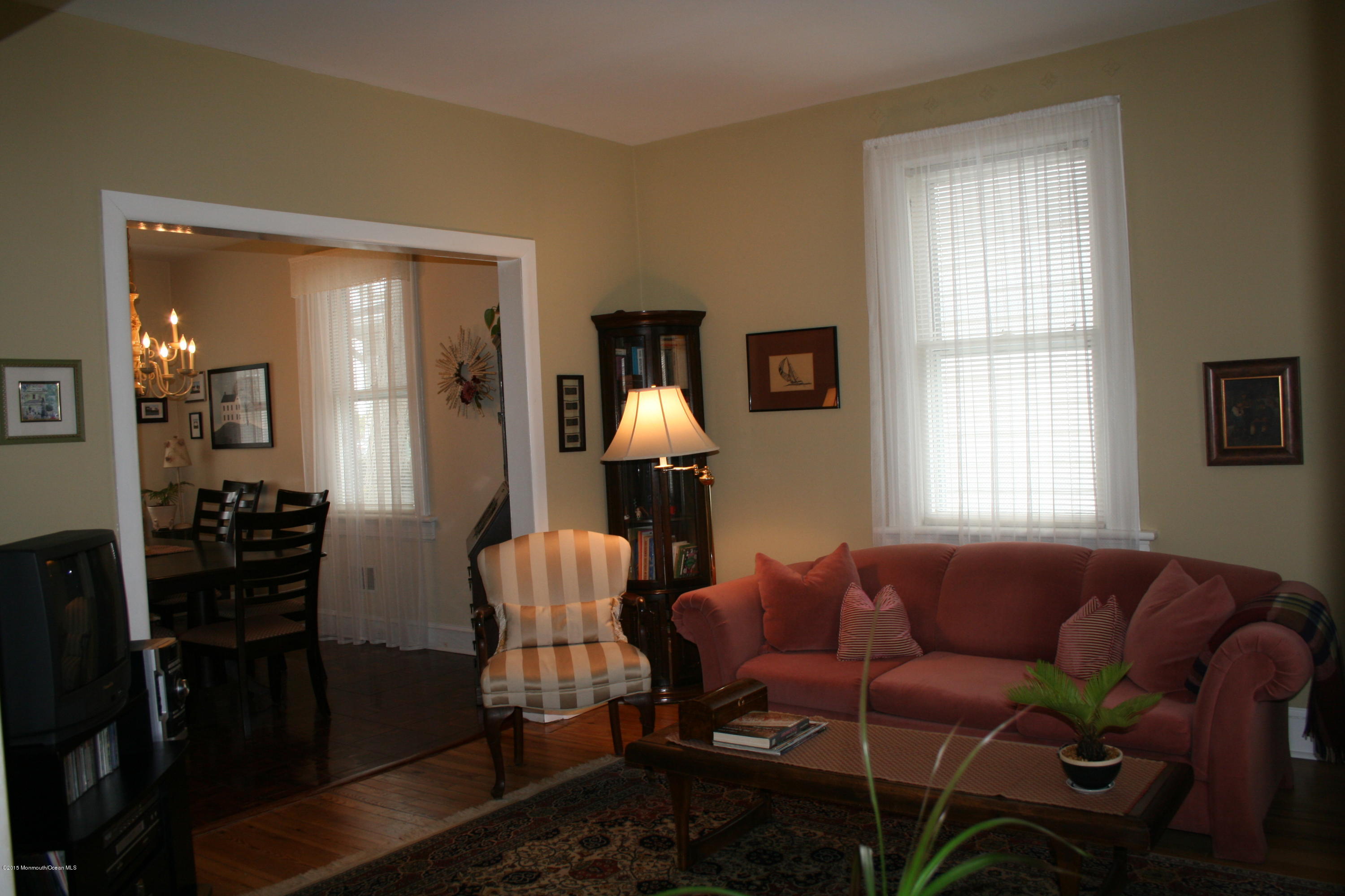 42 Spring Street Red Bank, NJ 07701 - Photo 4 of 24 a living room with furniture and wooden floor