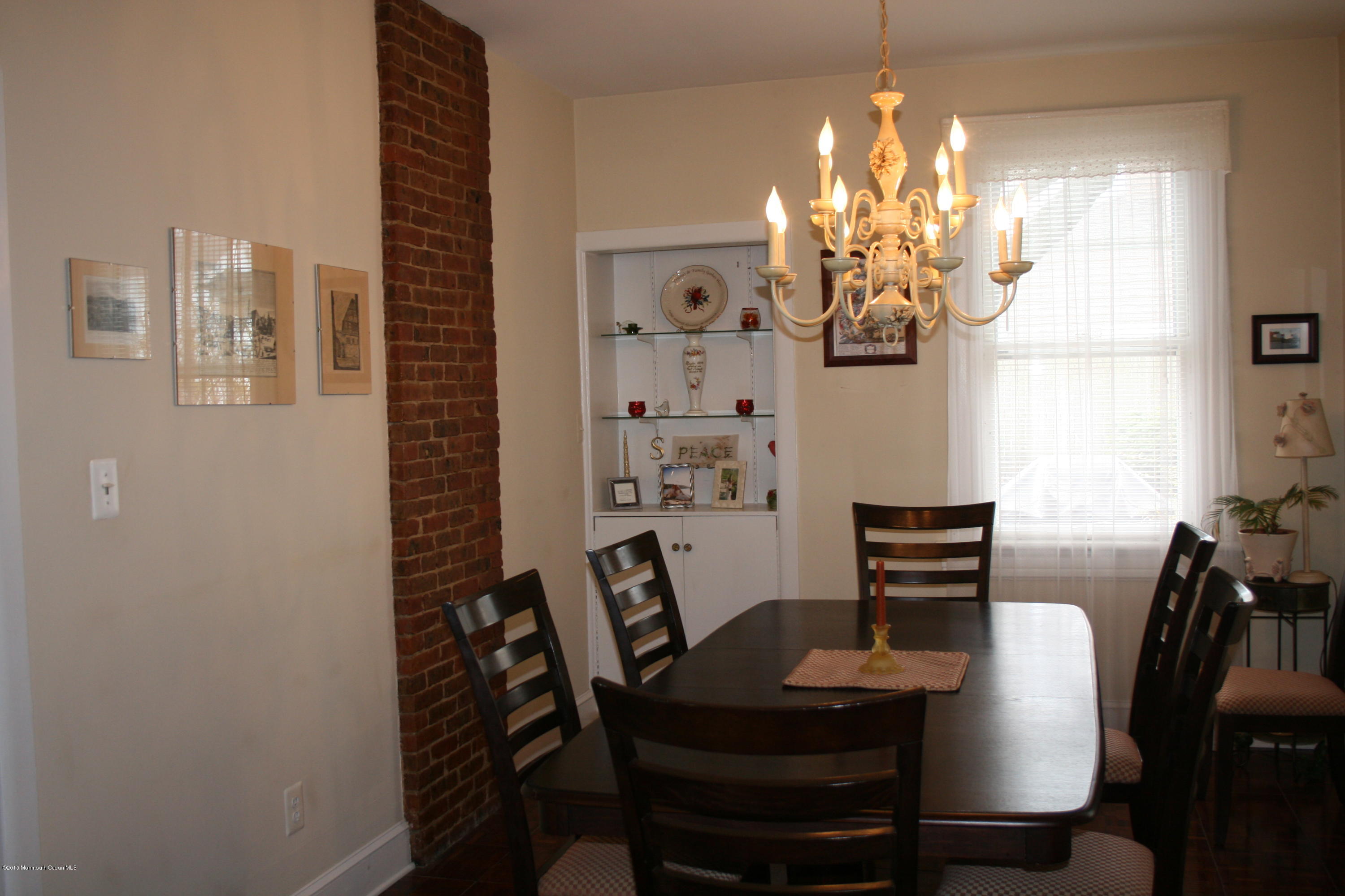 42 Spring Street Red Bank, NJ 07701 - Photo 8 of 24 a dining room with furniture and window