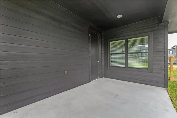 a house view with a garden space