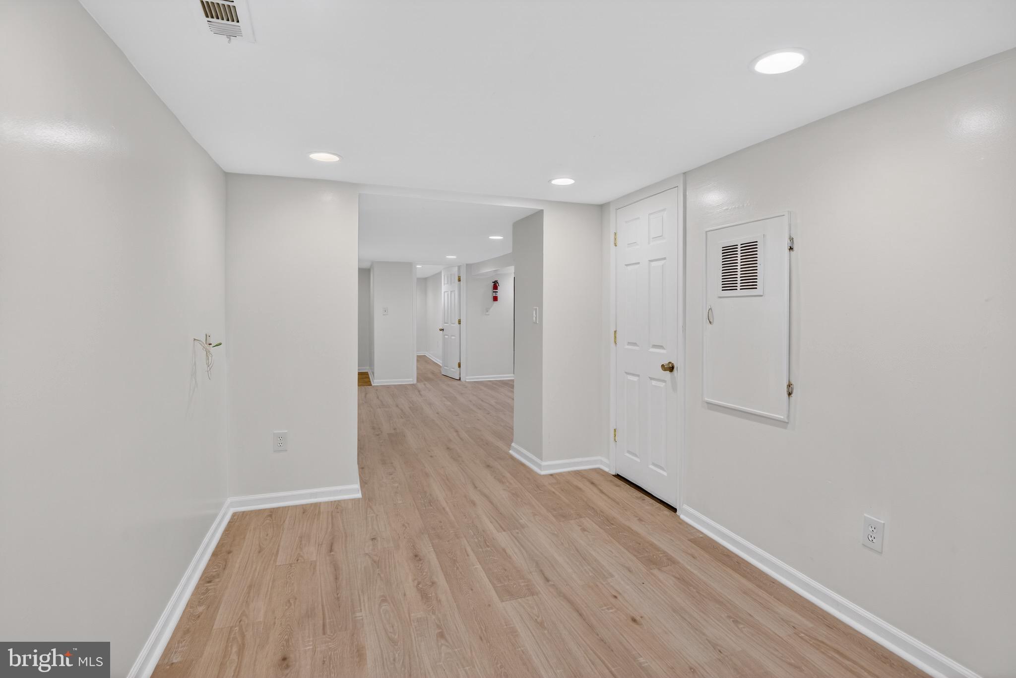 141 Uhland Terrace Northeast Washington, DC 20002 - Photo 12 of 16 a view of a hallway with wooden floor