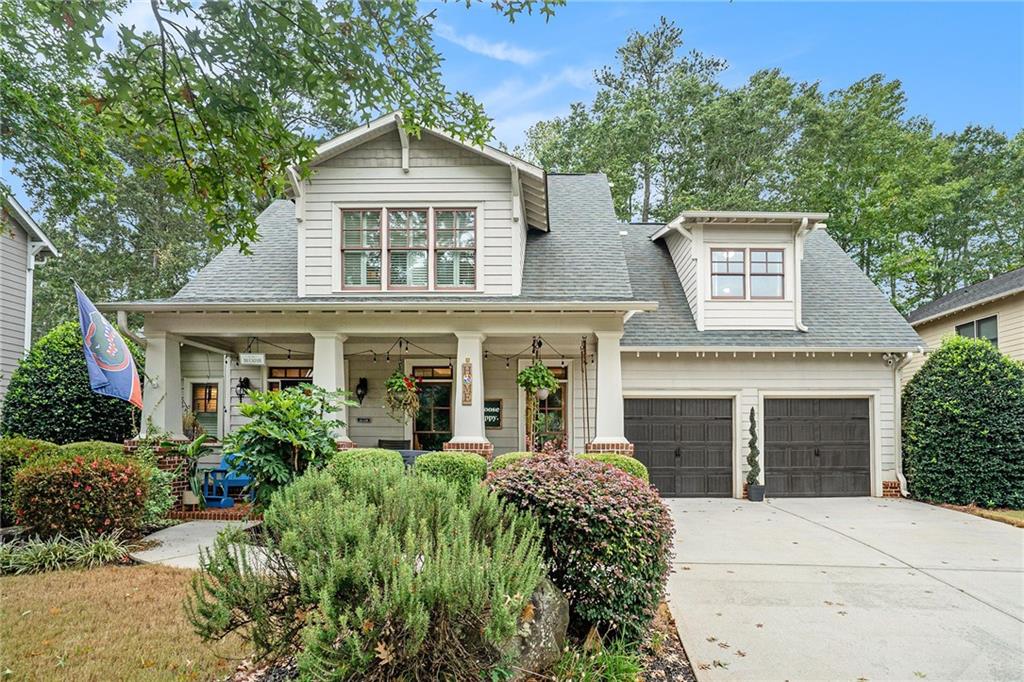 2717 Oak Village Trail Decatur, GA 30032 - Photo 1 of 1 front view of a house with a garden