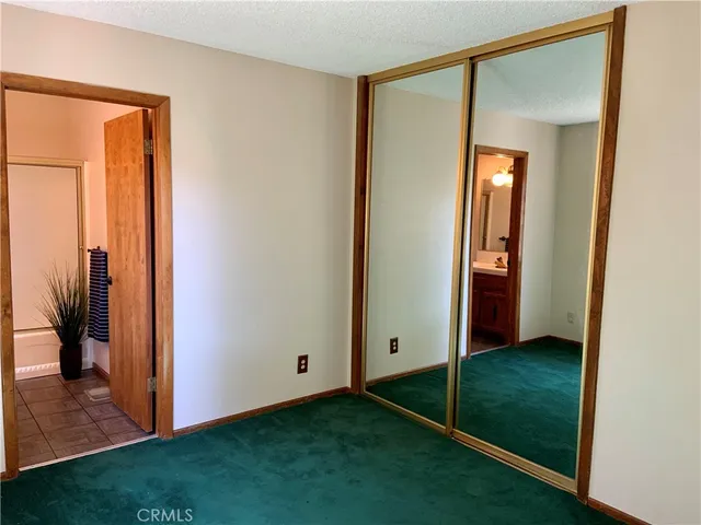 a view of an front door and yard