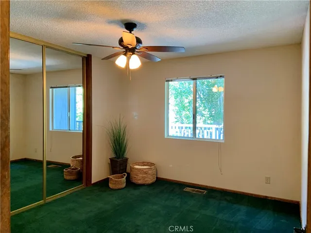 a view of an entryway with a workspace