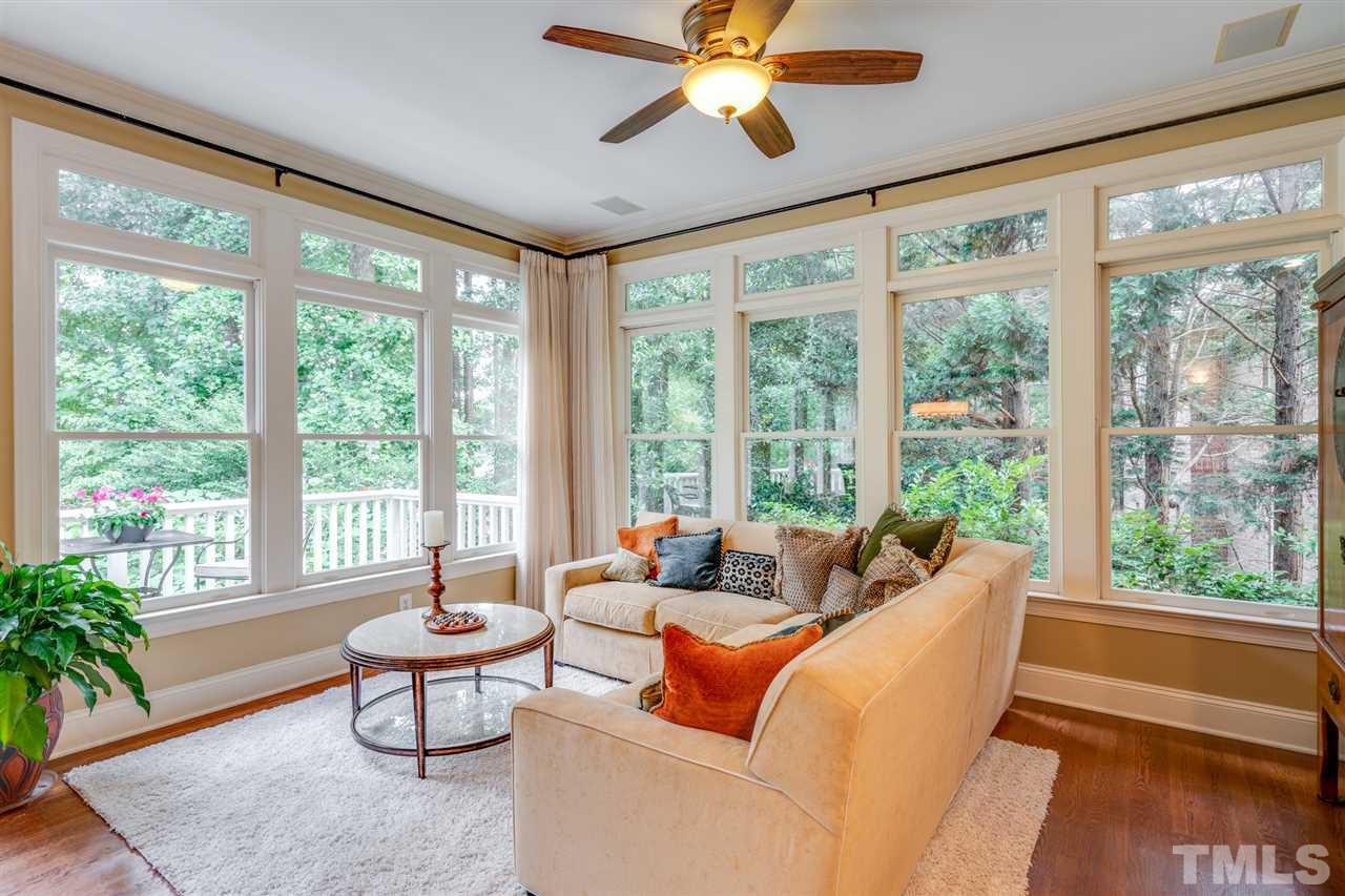 7604 Kelmscot Way Raleigh, NC 27615 - Photo 16 of 30 a living room with furniture and a large window
