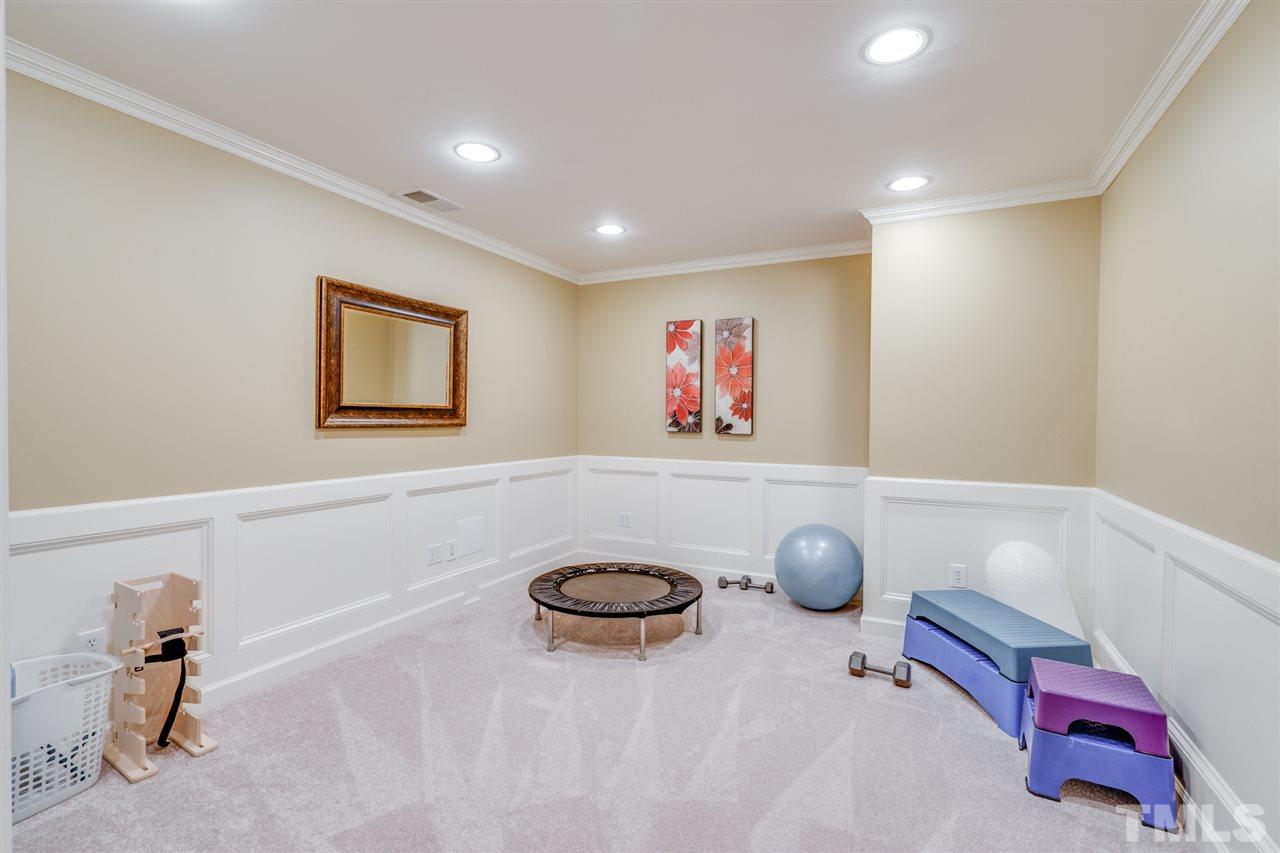 7604 Kelmscot Way Raleigh, NC 27615 - Photo 27 of 30 a room with gym equipment