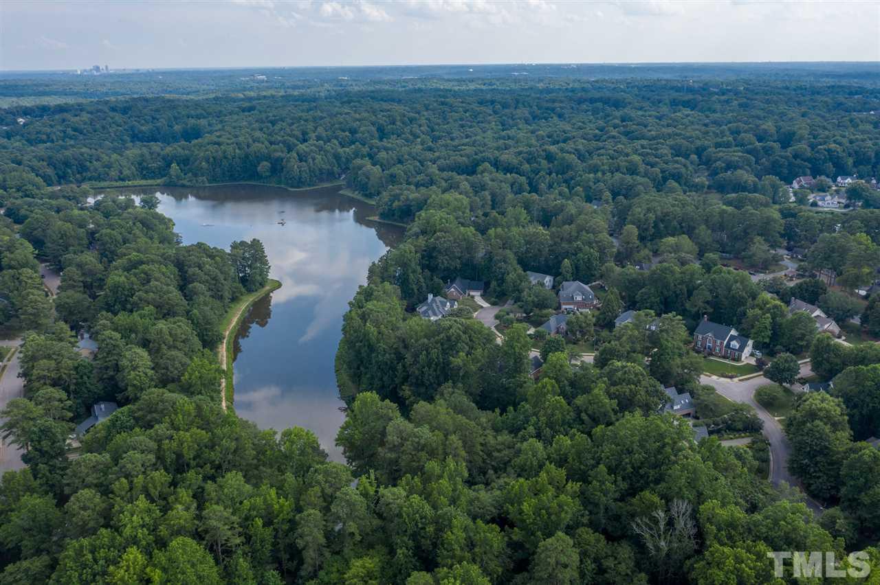 7604 Kelmscot Way Raleigh, NC 27615 - Photo 30 of 30 an aerial view of green landscape with trees
