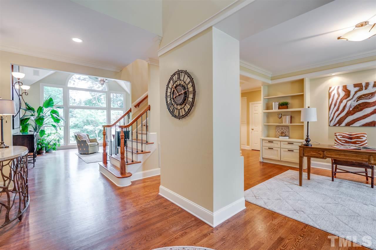 7604 Kelmscot Way Raleigh, NC 27615 - Photo 8 of 30 a view of entryway with wooden floor