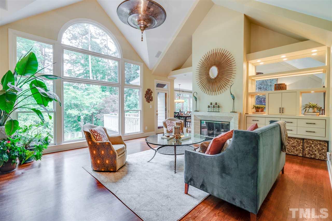 7604 Kelmscot Way Raleigh, NC 27615 - Photo 10 of 30 a living room with furniture and a large window