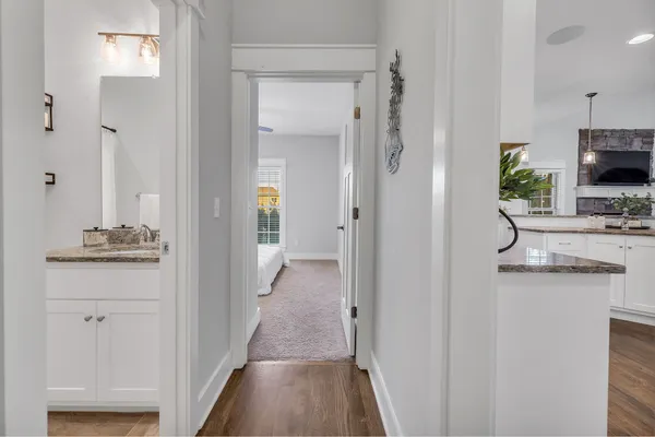 a view of a bathroom from the hallway