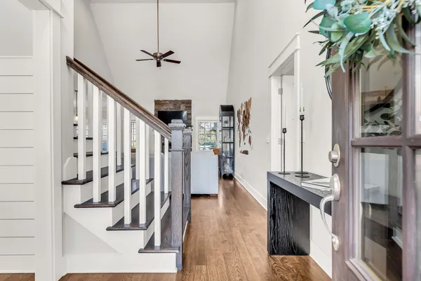 a view of entryway with wooden floor