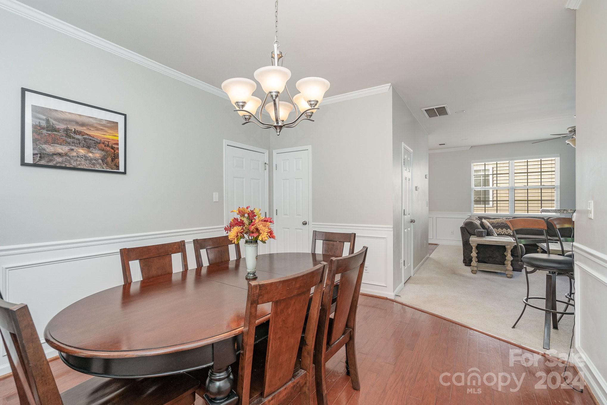 3367 Streamside Drive Davidson, NC 28036 - Photo 15 of 35 a view of a dining room with furniture