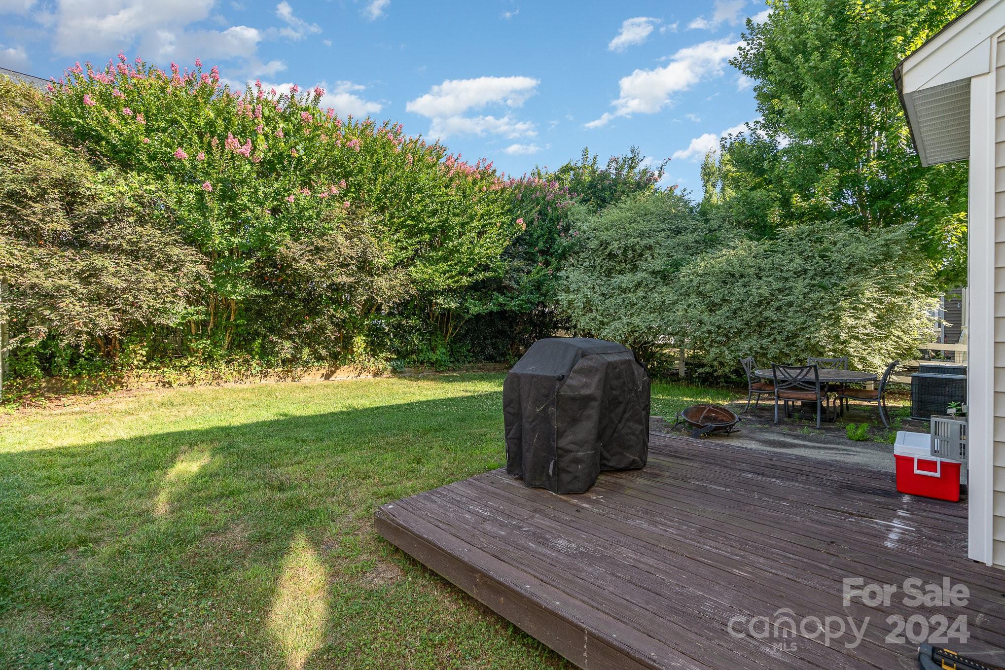 3367 Streamside Drive Davidson, NC 28036 - Photo 35 of 35 a view of a backyard with sitting area
