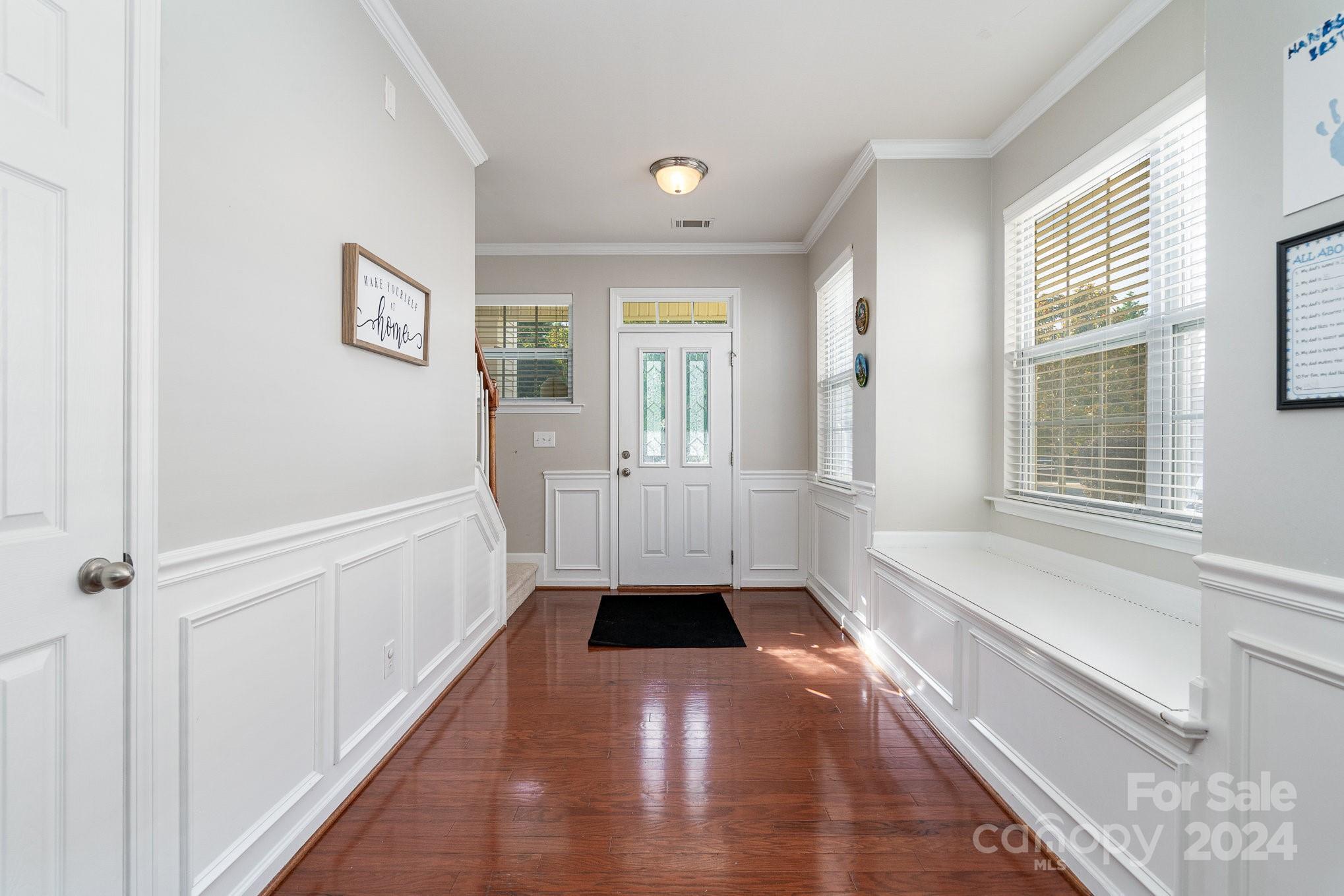 3367 Streamside Drive Davidson, NC 28036 - Photo 5 of 35 a hallway with window