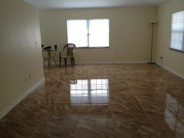 2855 Floral Road Lake Worth, FL 33462 - Photo 14 of 19 a view of livingroom with window