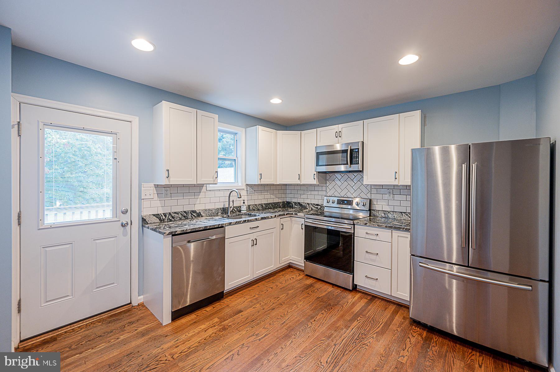 8606 Winands Road Randallstown, MD 21133 - Photo 22 of 42 Kitchen- Fresh Paint! Stainless Steel!