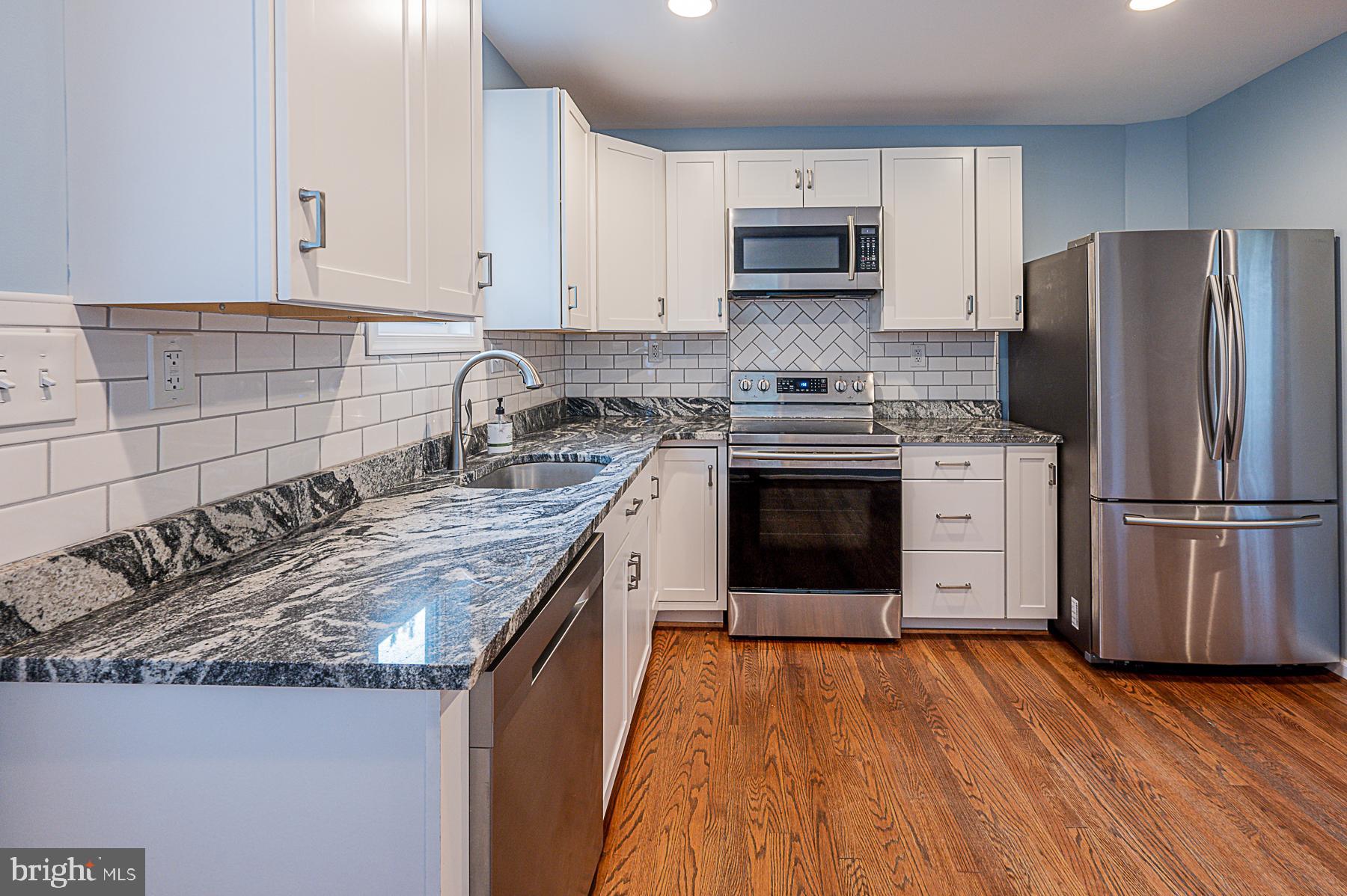 8606 Winands Road Randallstown, MD 21133 - Photo 24 of 42 Kitchen- Fresh Paint! Stainless Steel!