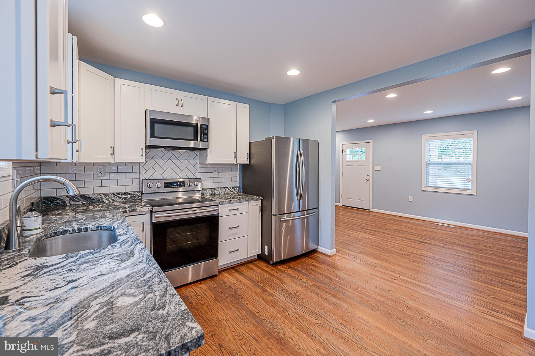 8606 Winands Road Randallstown, MD 21133 - Photo 25 of 42 Kitchen- Fresh Paint! Stainless Steel!