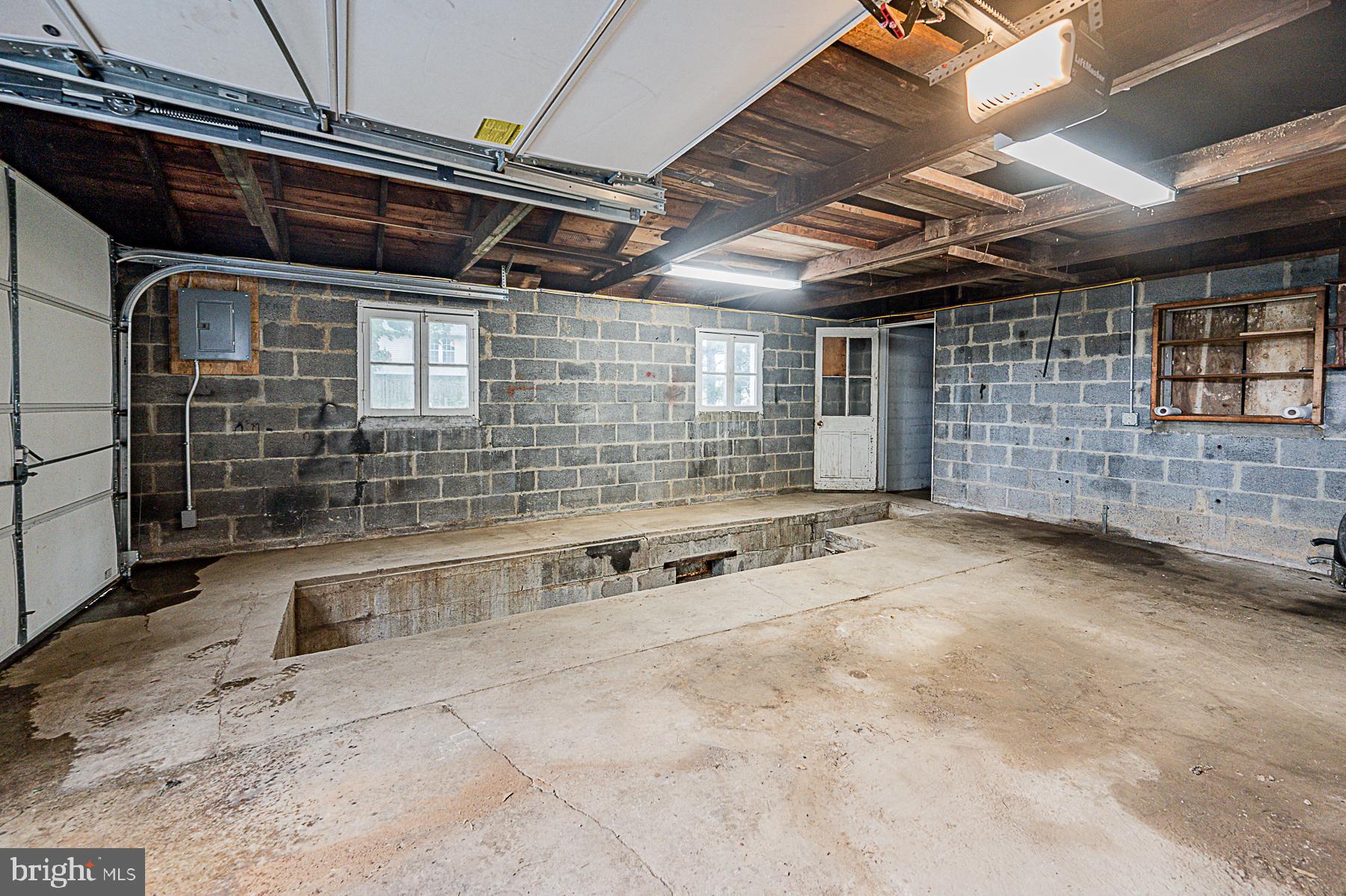 8606 Winands Road Randallstown, MD 21133 - Photo 40 of 42 Interior of Garage. Deep Pit for Working on Cars!