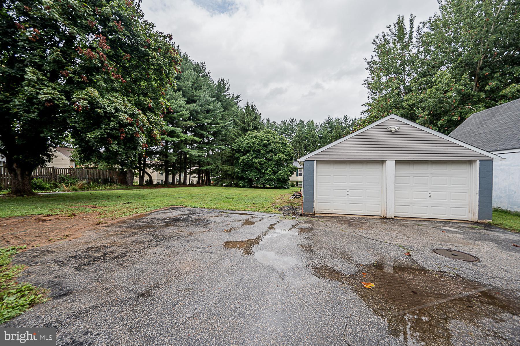8606 Winands Road Randallstown, MD 21133 - Photo 7 of 42 Ample Parking! Massive Detached Garage w/ 3 Doors