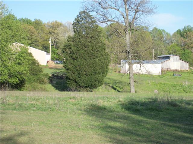 125 Thurman Kepley Road Portland, TN 37148 - Photo 19 of 20 VIEW FROM BACK OF THE PROPERTY, SHOWING SOME OF THE BARNS FROM THIS ANGLE