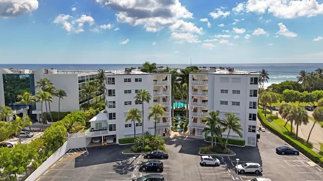 a view of a balcony with chairs