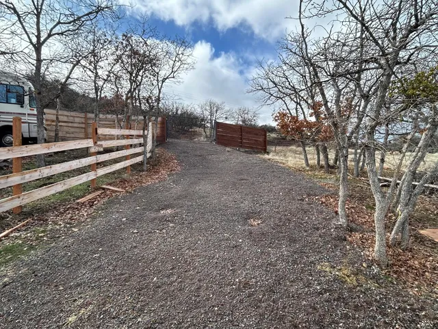 a view of backyard with green space