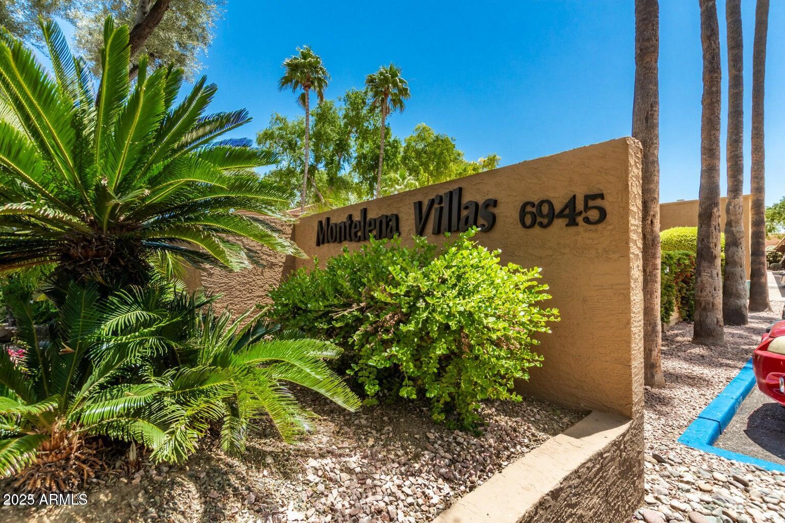 6945 East Cochise Road, Unit 130 Paradise Valley, AZ 85253 - Photo 22 of 24 a sign that is on a brick wall