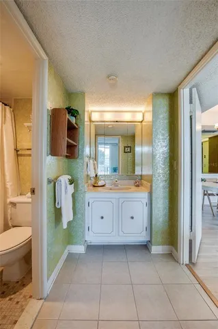 a bathroom with a toilet and a bathtub