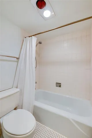 a view of a lobby with furniture and floor to ceiling window