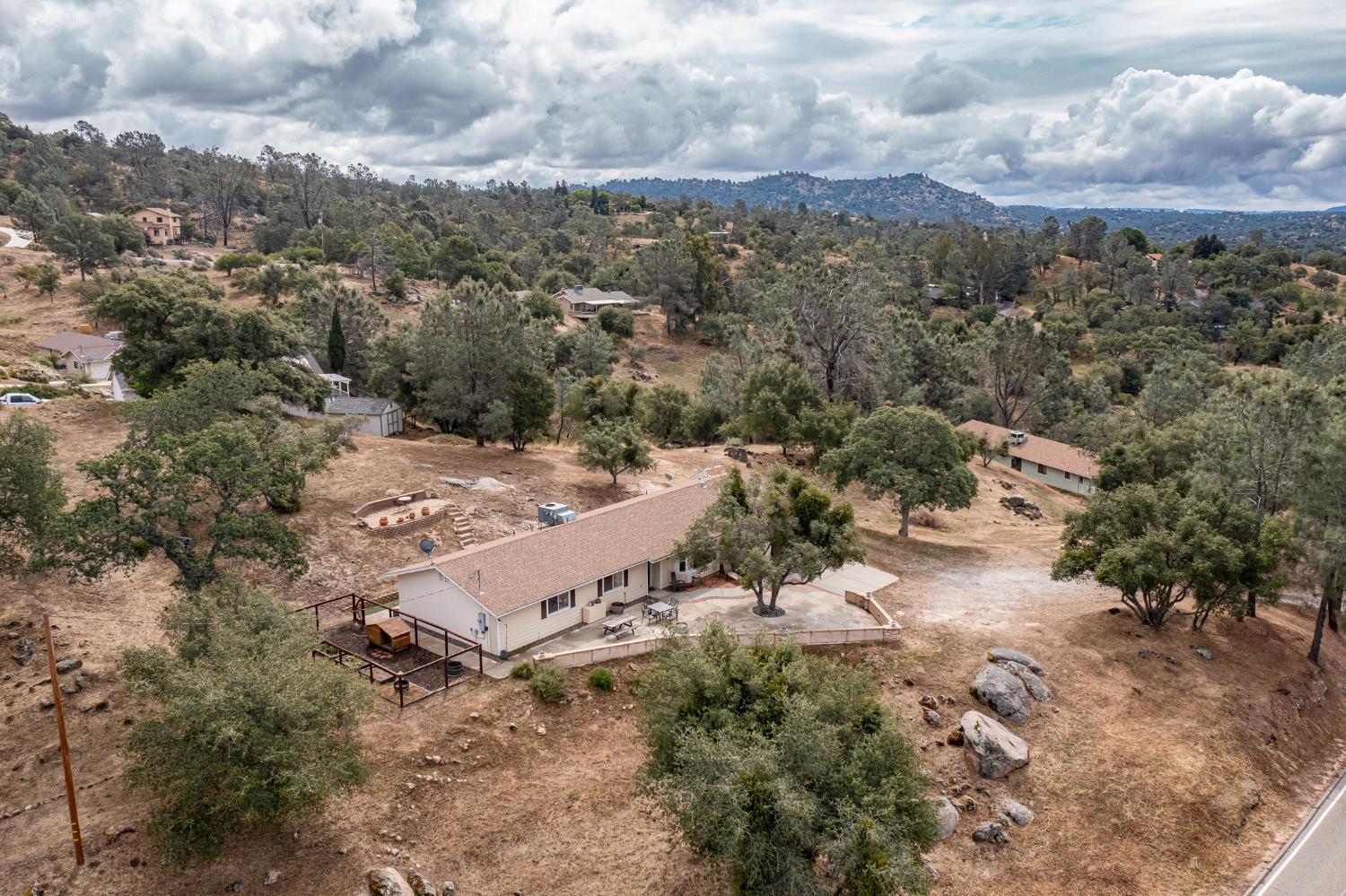 29395 Revis Road Coarsegold, CA 93614 - Photo 28 of 32 an aerial view of a house with a yard