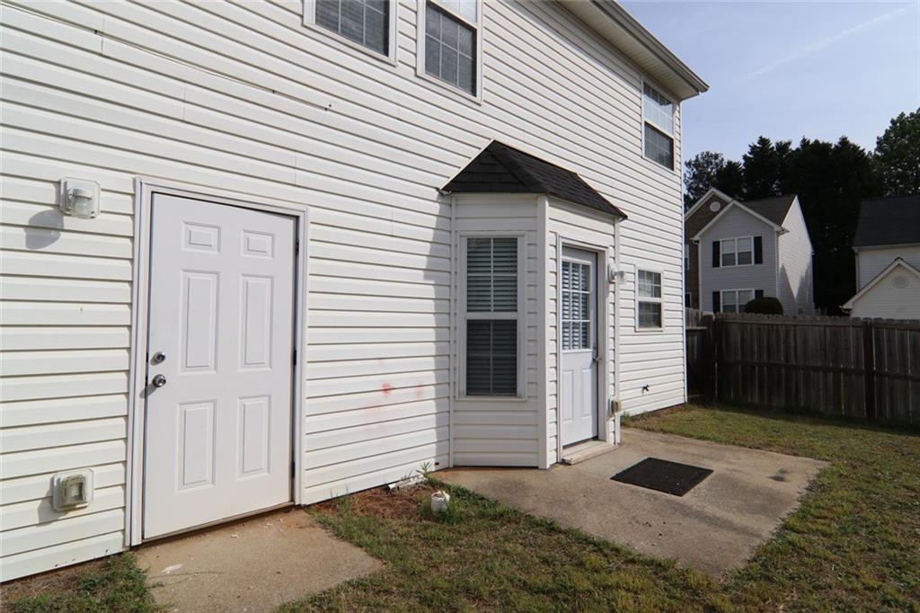363 Springhaven Way Southeast Lawrenceville, GA 30046 - Photo 13 of 13 a view of a house with a door