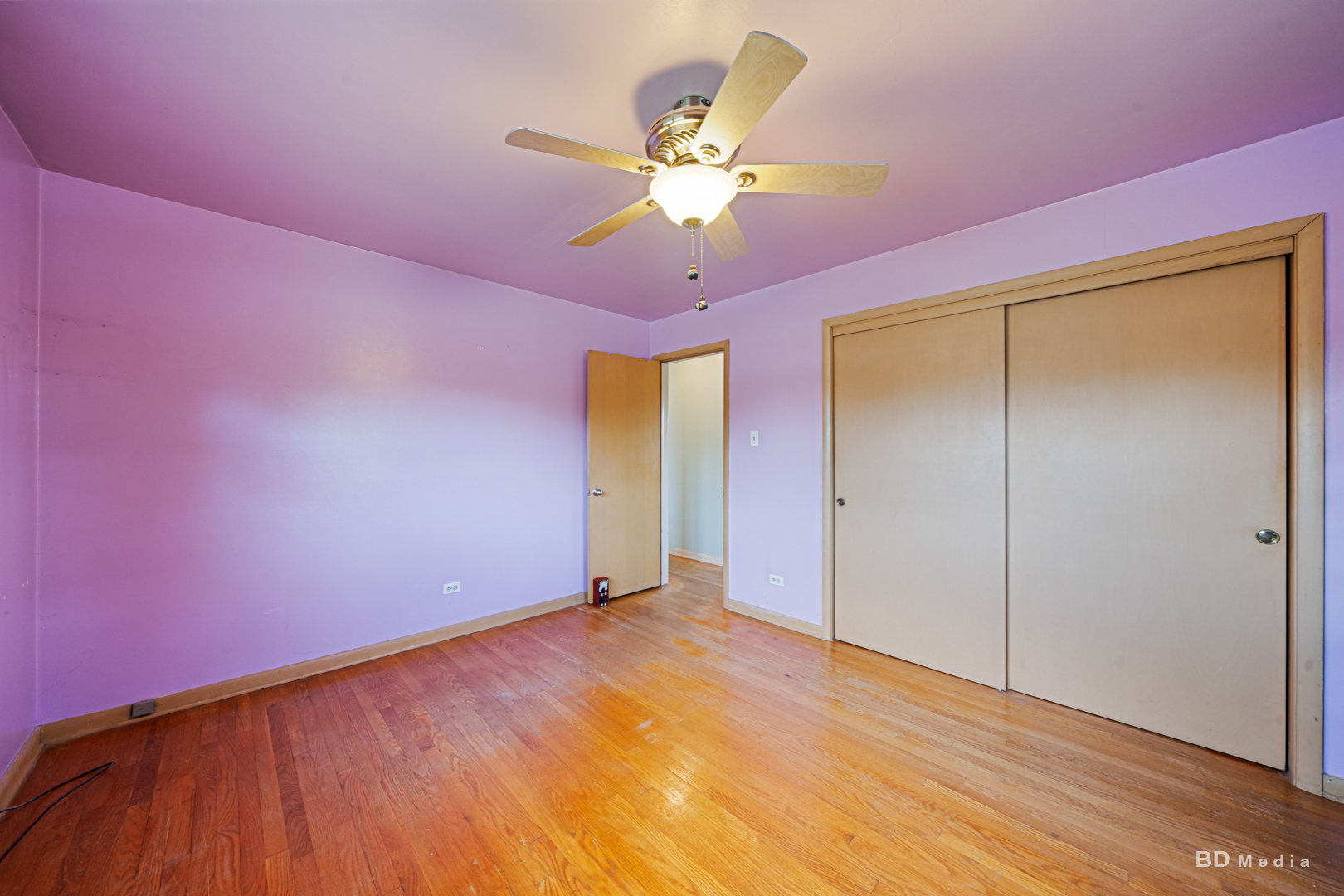 17510 Western Avenue Homewood, IL 60430 - Photo 11 of 19 wooden floor in an empty room with a window