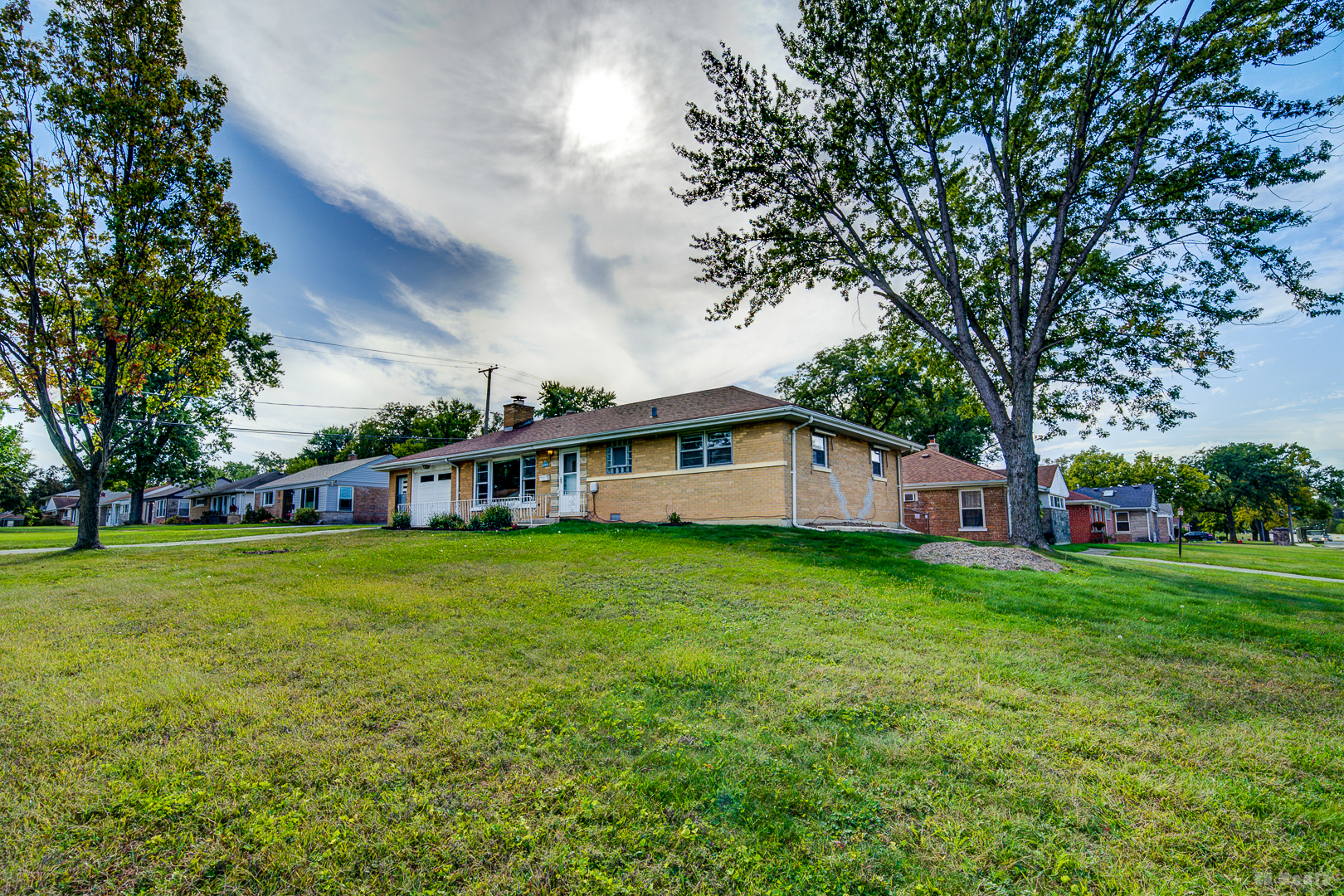 17510 Western Avenue Homewood, IL 60430 - Photo 16 of 19 a front view of a house with garden