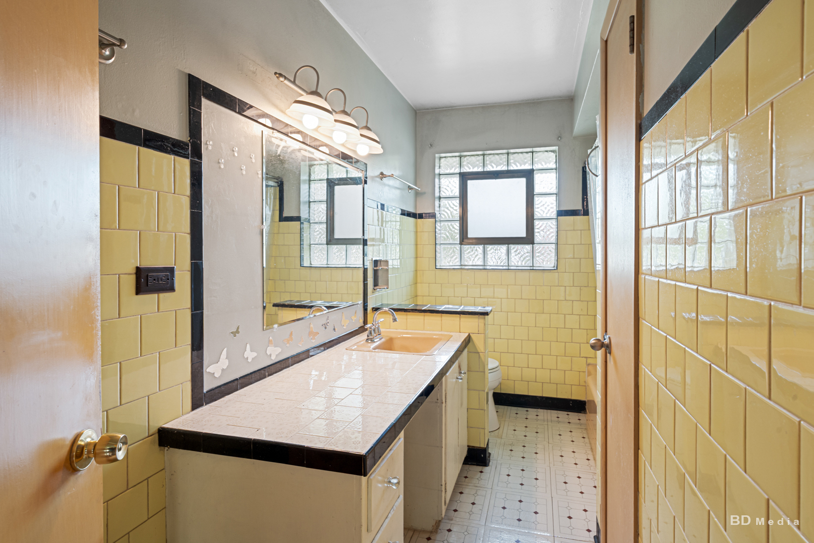17510 Western Avenue Homewood, IL 60430 - Photo 9 of 19 a bathroom with a sink and a mirror