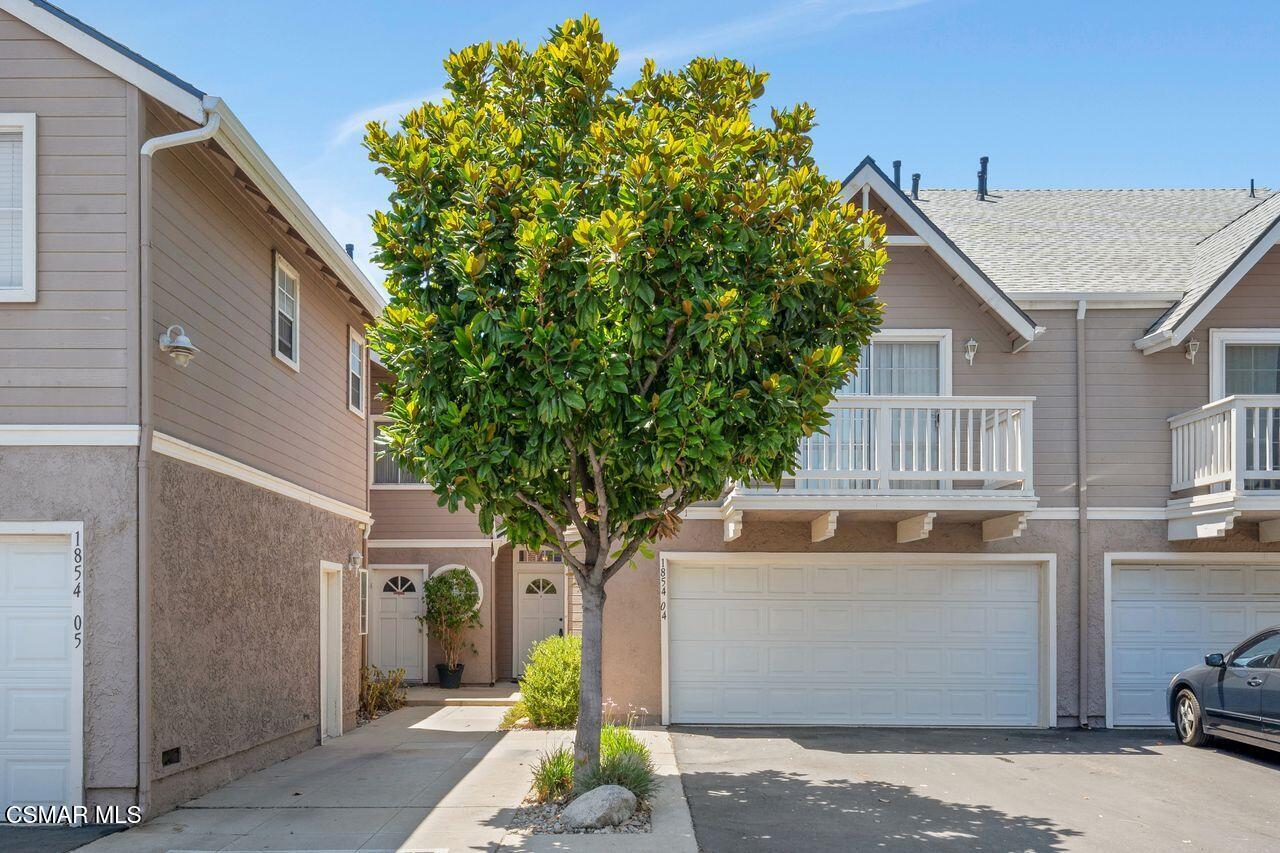 1854 Rory Lane, Unit 4 Simi Valley, CA 93063 - Photo 1 of 37 a front view of a house with garden