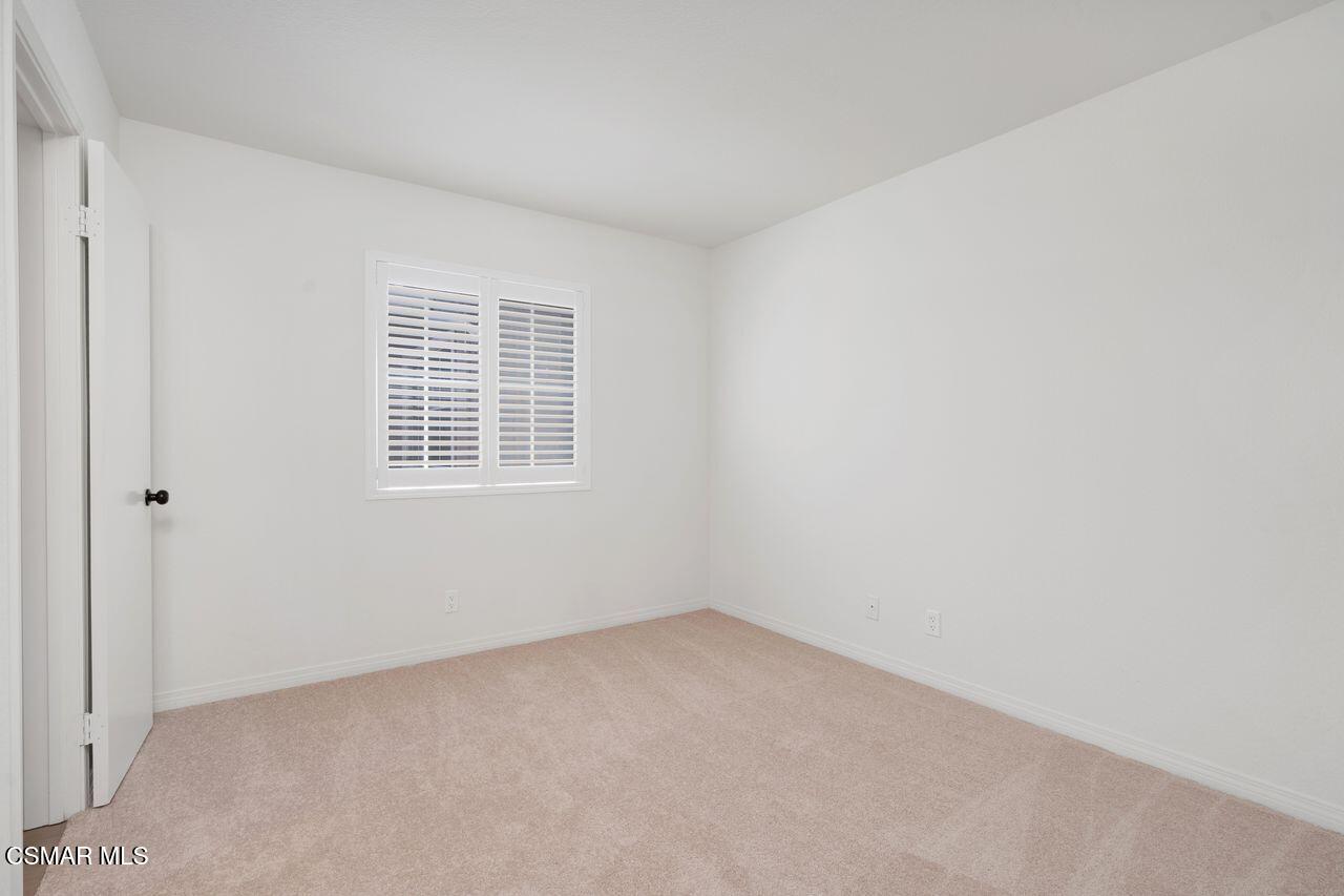 1854 Rory Lane, Unit 4 Simi Valley, CA 93063 - Photo 16 of 37 a view of an empty room with a window
