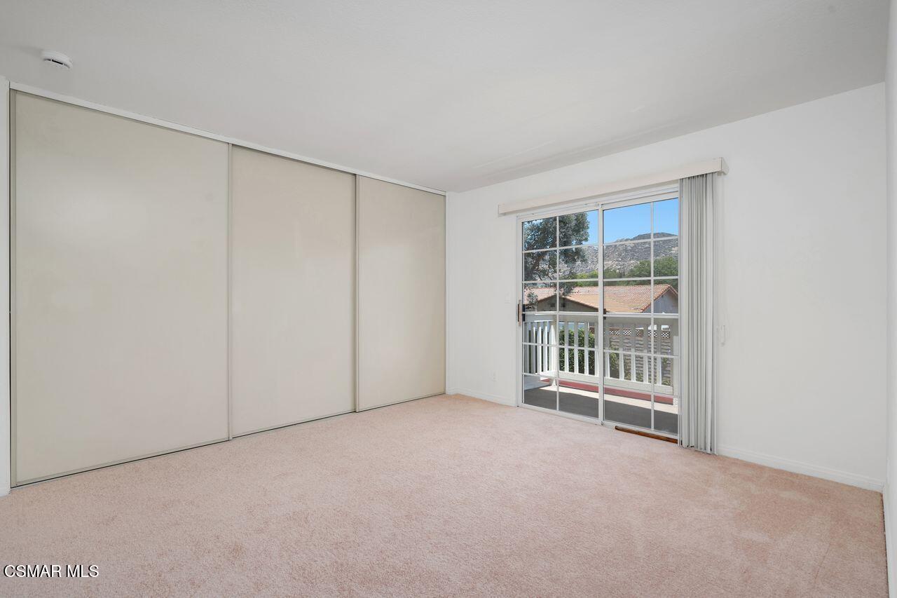 1854 Rory Lane, Unit 4 Simi Valley, CA 93063 - Photo 20 of 37 an empty room with windows