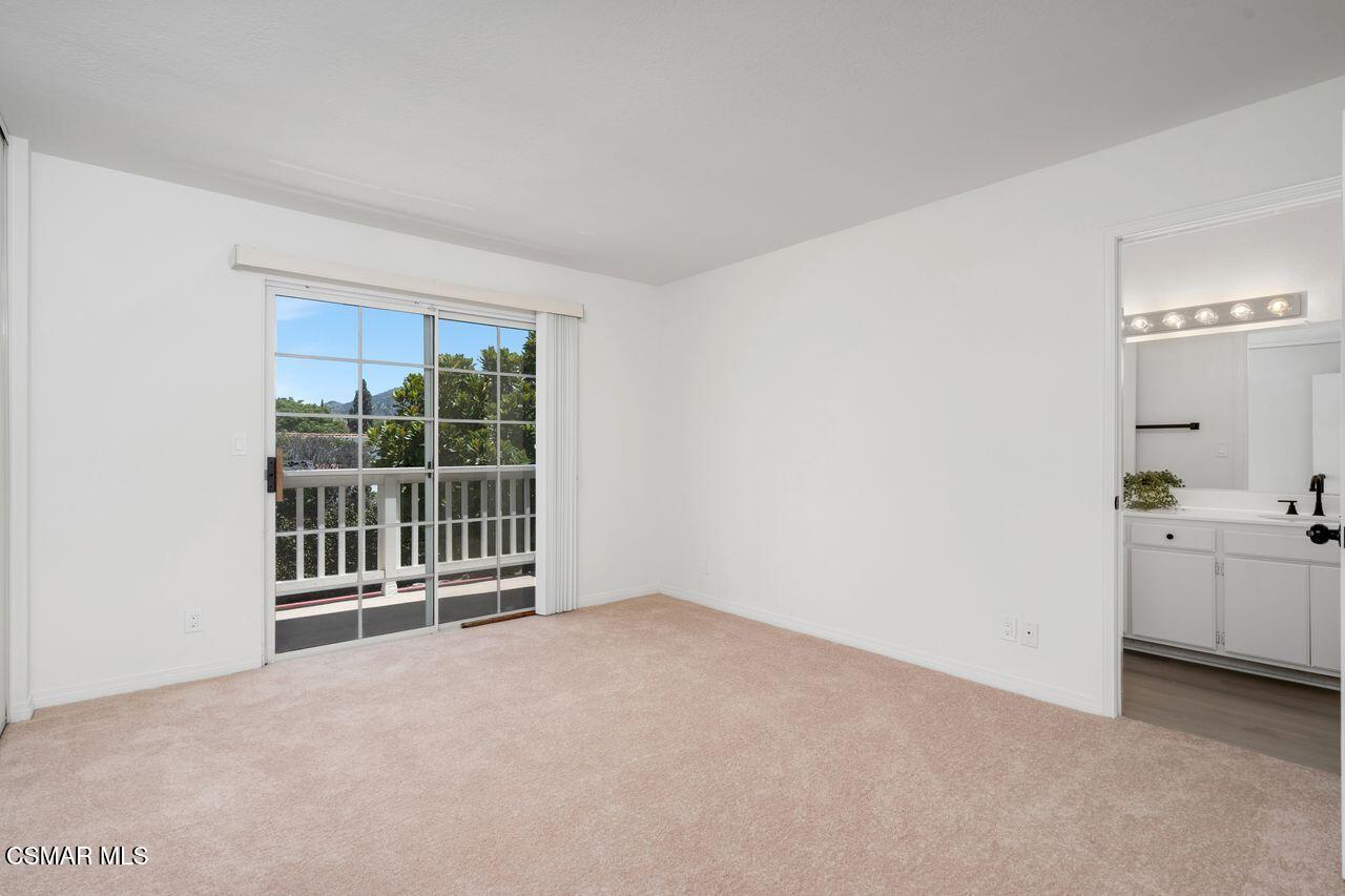 1854 Rory Lane, Unit 4 Simi Valley, CA 93063 - Photo 21 of 37 a view of an empty room with a window