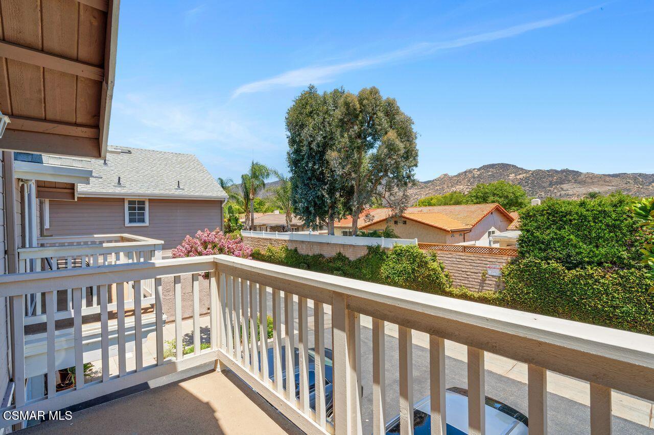 1854 Rory Lane, Unit 4 Simi Valley, CA 93063 - Photo 22 of 37 a view of a city from a balcony