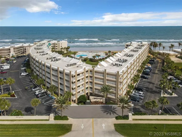 a view of building with ocean view