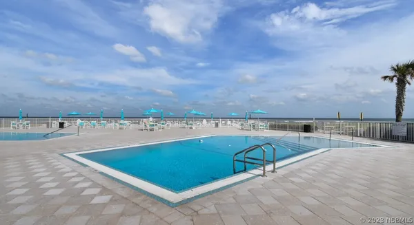 a view of outdoor space and swimming pool