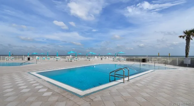 a view of outdoor space and swimming pool