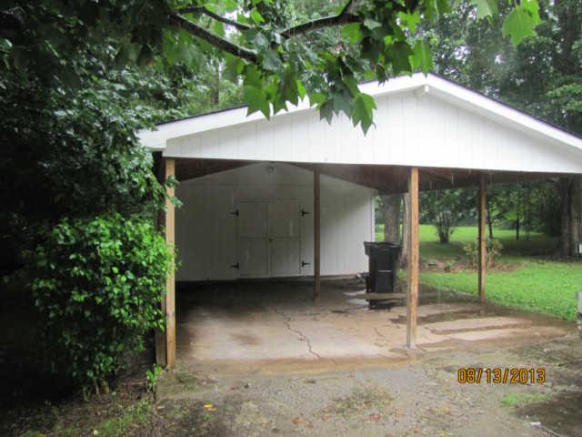 2 CAR CARPORT WITH ATTACHED STORAGE BUILDING WITH ELECTRICITY