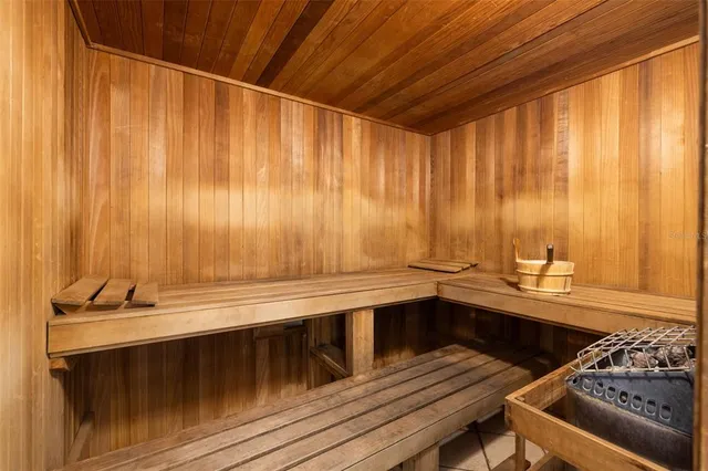 a view of a kitchen with a sink and cabinets